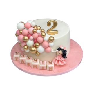 pink and golden bubbles cake